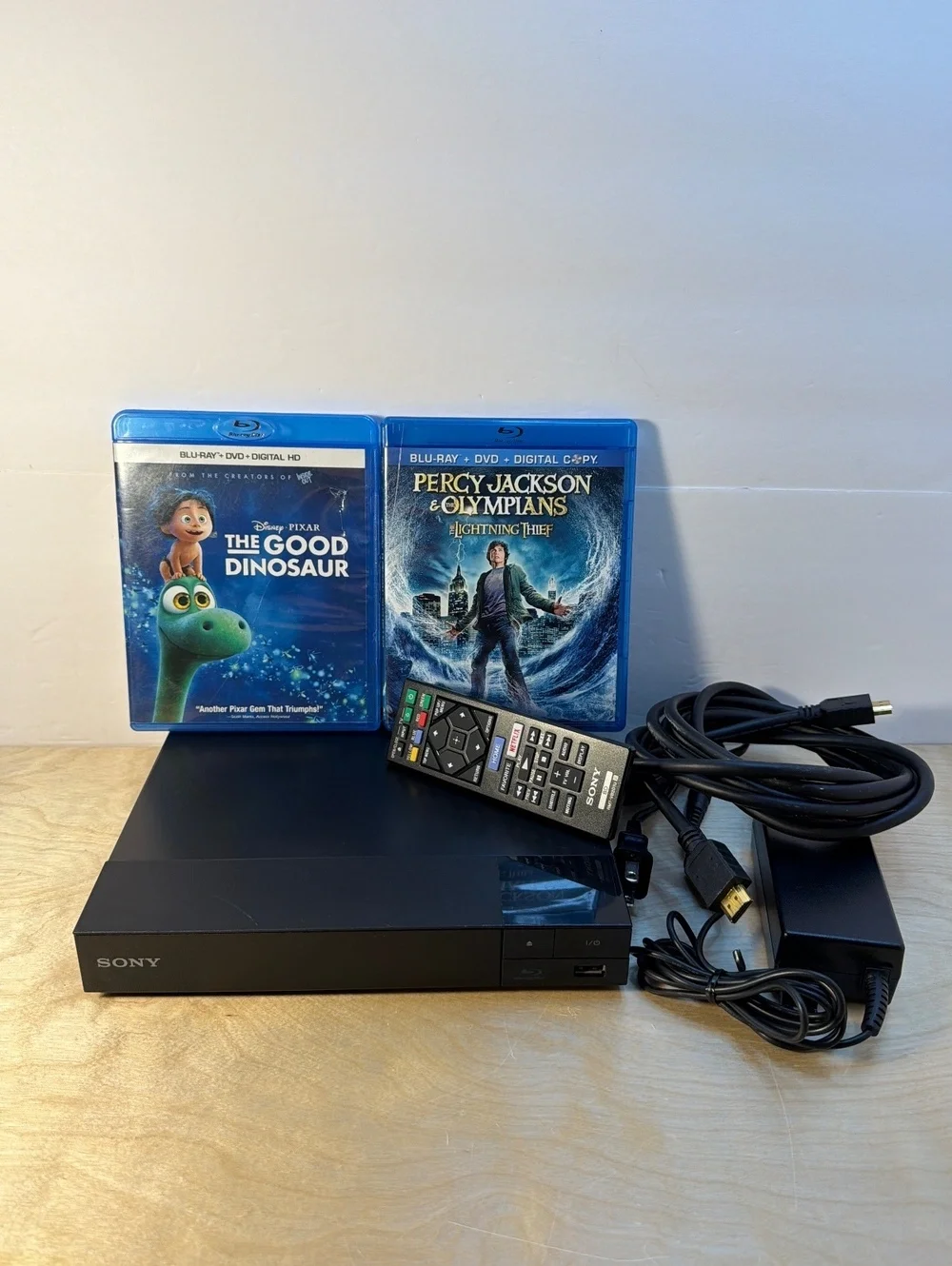 Sony BDP-S2500 Blu-ray DVD Player with Remote Power Adapter & Movies Bundle